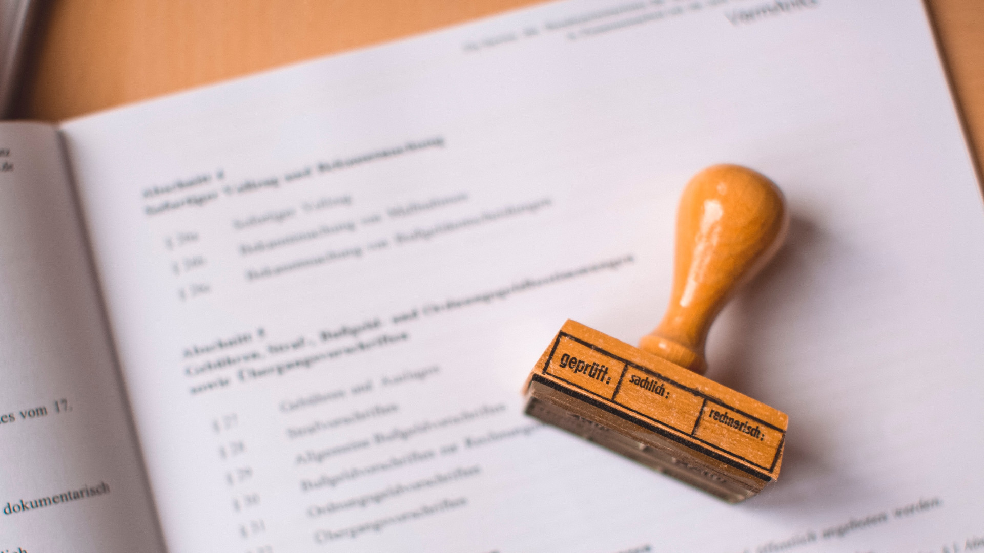 a stamp on top of documents (picture by Markus Spiske, Erlangen, 2021)